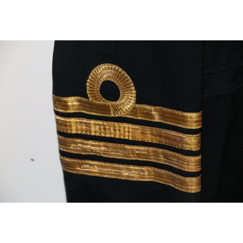 569 - British Royal Navy dress uniform jacket having Gieves label 