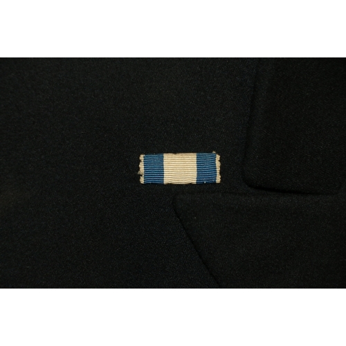 575 - British Royal Navy dress uniform jacket having Gieves Ltd label 