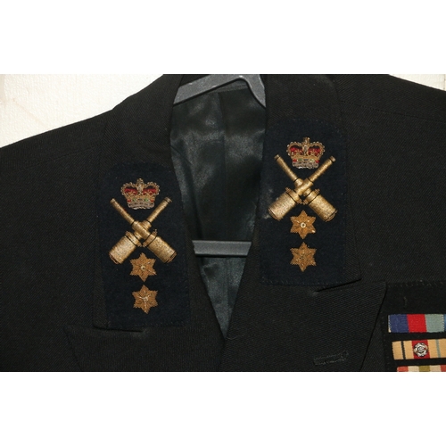 576 - British Royal Navy dress uniform jacket having Jackson of Hong Kong label with brass naval buttons b... 