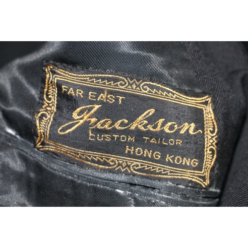 576 - British Royal Navy dress uniform jacket having Jackson of Hong Kong label with brass naval buttons b... 