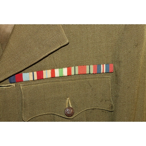 595 - British Army dress uniform jacket with Celtic knot decorated leather buttons, a pair of British War ... 