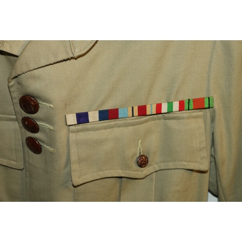 602 - British Army dress uniform jacket with Army and Navy Stores of London label, Celtic knot leather but... 