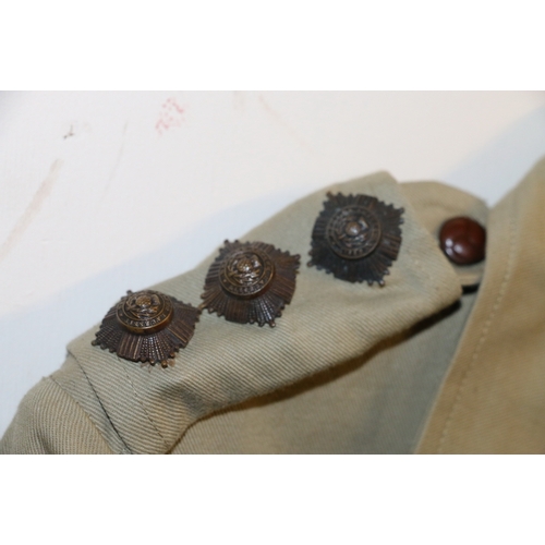 602 - British Army dress uniform jacket with Army and Navy Stores of London label, Celtic knot leather but... 