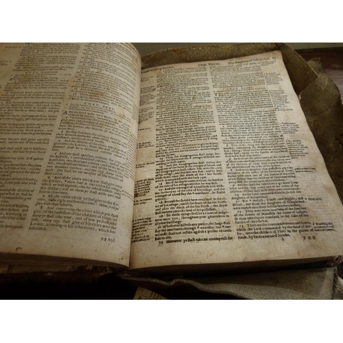 240 - Breeches Bible.  Late 16th century bible, small quarto in deerskin bdg., poor cond. with torn & ... 