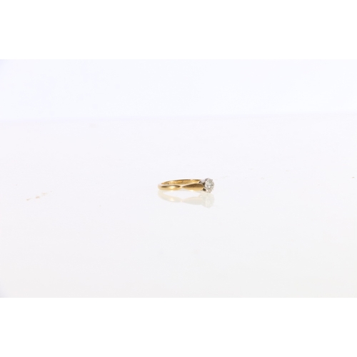 104 - 18ct yellow gold and platinum solitaire ring, the diamond approximately 0.2ct, maker WJS, ring size ... 