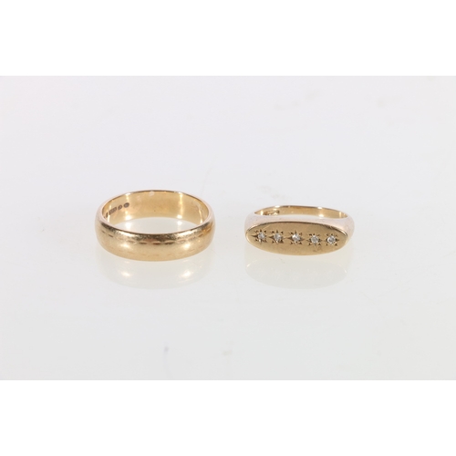 62 - 9ct yellow gold wedding band ring, size S 4.5g and a 9ct yellow gold dress ring set with five small ... 