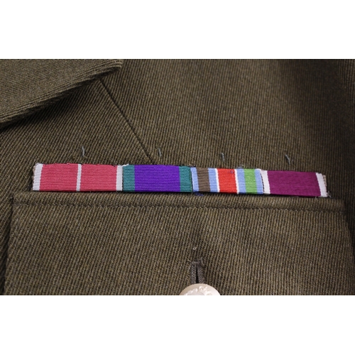 41 - British Army dress uniform jacket having Van Dungie label penned 