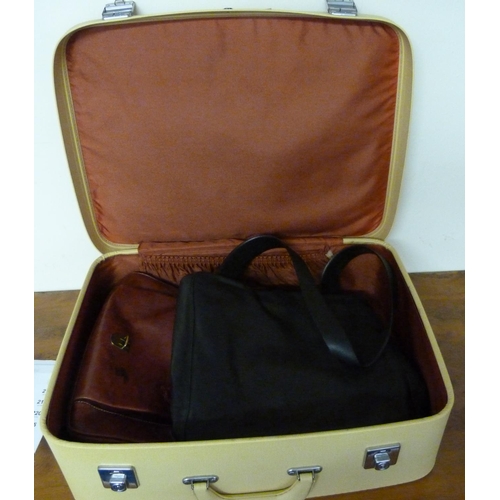 209 - Suitcase and two lady's handbags