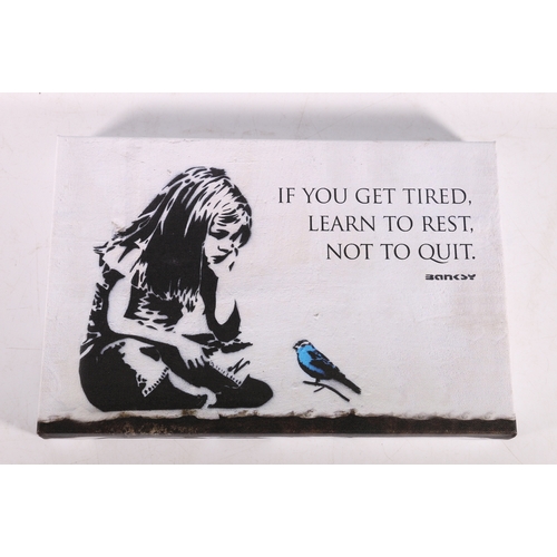 215 - Banksy print on canvas.