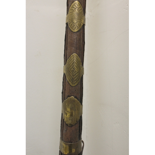 126 - Antique Turkish Jezail camel gun measuring 166cm in length. The barrel being brass bound is engraved... 