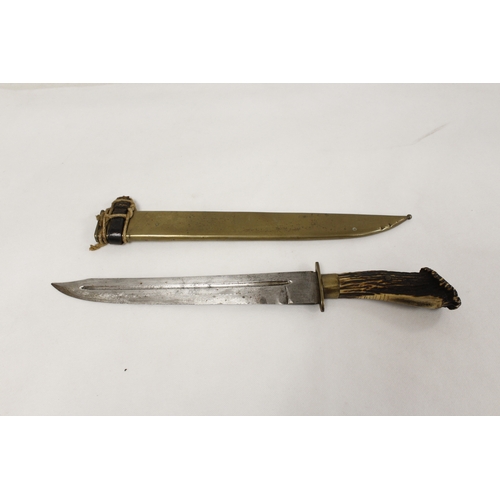 81 - German steel hunting knife with antler handle in brass scabbard. 28cm blade.