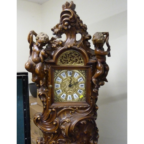 118 - Preproduction Black Forest style carved longcase clock