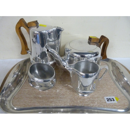 253 - Piquot ware tea set and a tray