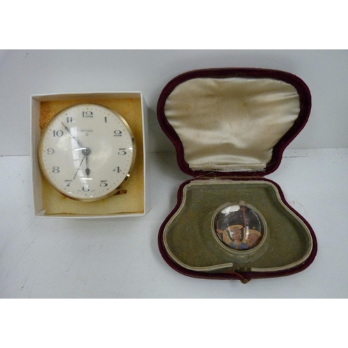 57 - Swiza alarm clock and a small paperweight (2)