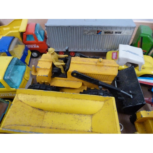 77 - Collection of various Tonka toys to include diggers and lorries