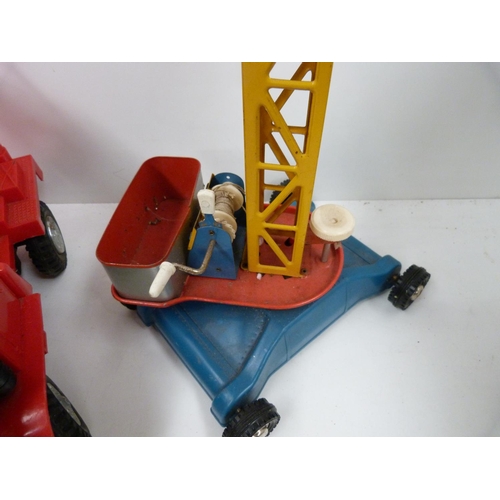 90 - Three large toy construction vehicles to include crane, cement mixer and digger