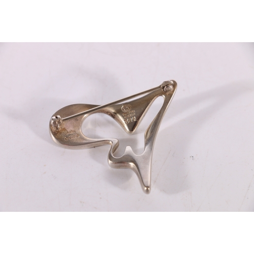 115 - Henning Koppel for Georg Jensen Ltd, a 925 Sterling silver modernist amoeba brooch, marked 