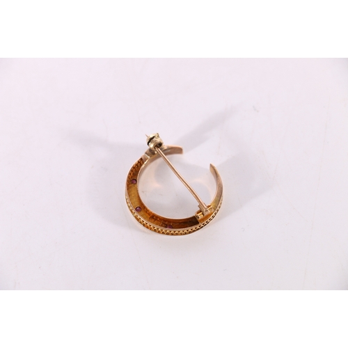 120 - 9ct yellow gold crescent moon brooch set with rubies and seed pearls, 2.5cm diameter, 3.1g gross