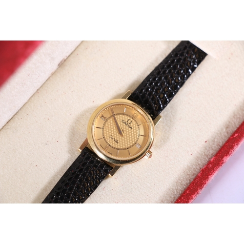 129 - 18ct gold Omega De Ville wristwatch with Roman Numeral chapters, textured centre to the dial, the re... 