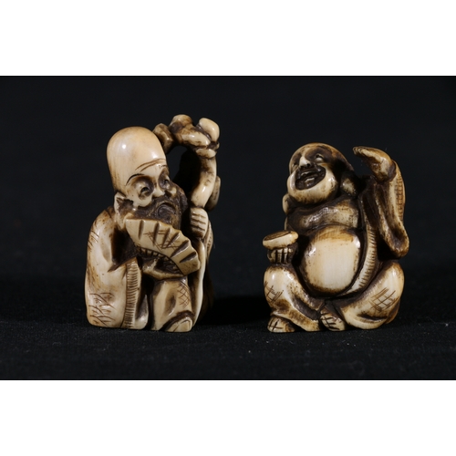 359 - Ivory netsuke of Fukurukuju holding a fan and a staff and another of a seated Hotei, by the same han... 