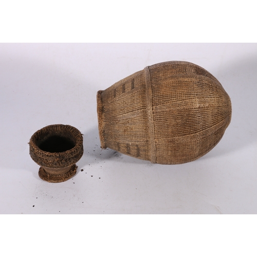 419 - West African Himba tribe ovoid milk jug with detachable lid formed as a cup, the body covered with s... 