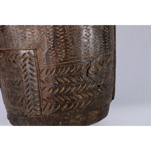 424 - Nepalese carved wooden pail with metal band to the rim, base and handles and twisted carrying ropes,... 