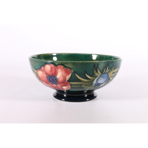 258 - Moorcroft bowl decorated with anemone pattern on a rich green ground, WM signature to base, 16.5cm d... 