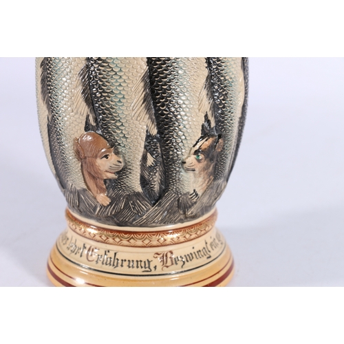 273 - Reinhold Merkelbach of Germany novelty pottery ale stein drinking tankard modelled with fish, dog an... 