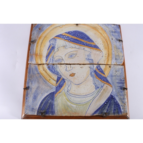 293 - 19th century style glazed earthenware tile of female saint, possibly Madonna, within frame, 40cm squ... 