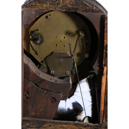 304 - An unusual carved mahogany death clock, the brass dial with gravestone supported by eagle, skull and... 