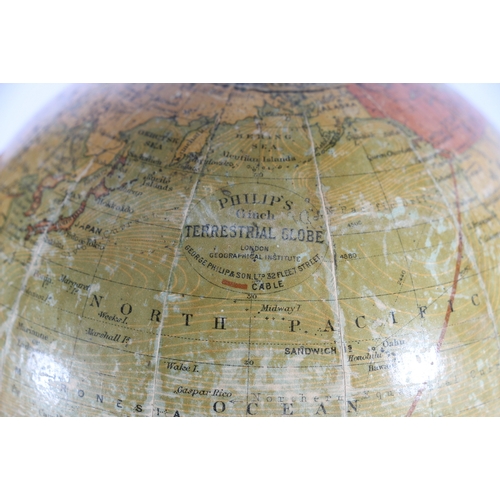 308 - Philip's 6 inch Terrestrial Globe by George Phillp & Son Ltd, raised on wood stand, 29cm