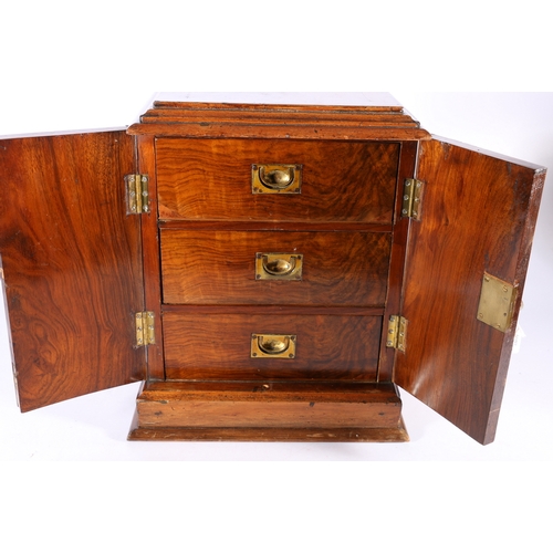 309 - Victorian walnut apprentice piece type small three-drawer table-top cabinet, 36cm tall