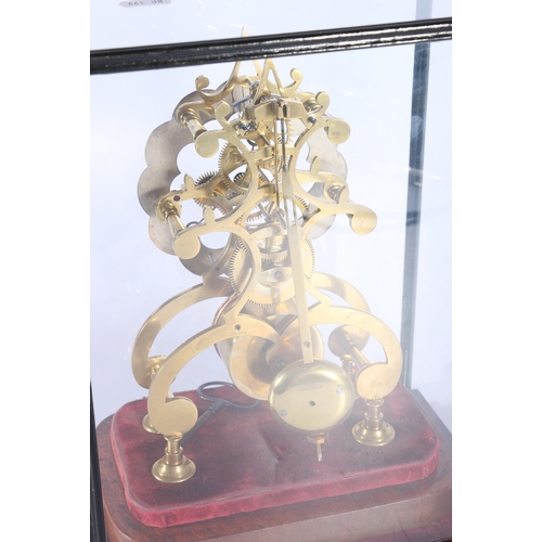 330 - Late 19th century brass skeleton clock under glass 