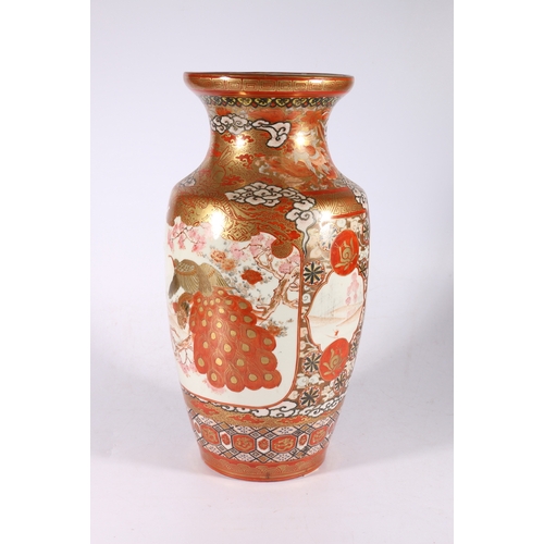 382 - A large Japanese Kutani high shouldered vase decorated with two panels depicting a rider and attenda... 