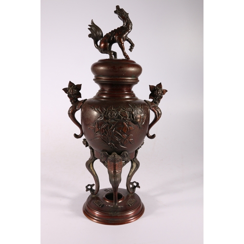 398 - Japanese incense burner on triple supports, the domed lid with kylin finial, the bulbous body decora... 