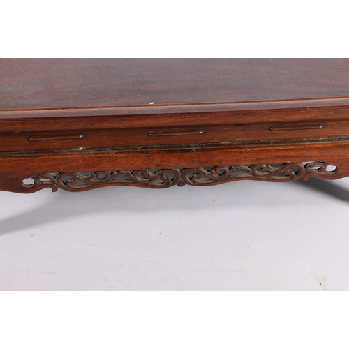 399 - Large 19th century Chinese hardwood stand, the rectangular top with shaped and pierced carved apron,... 