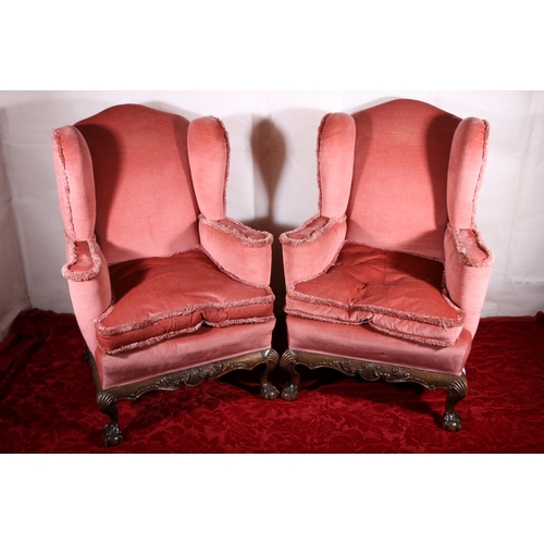 431 - Pair of Victorian mahogany wing back armchairs with carved and shaped skirt raised on cabriole suppo... 