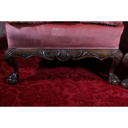 431 - Pair of Victorian mahogany wing back armchairs with carved and shaped skirt raised on cabriole suppo... 