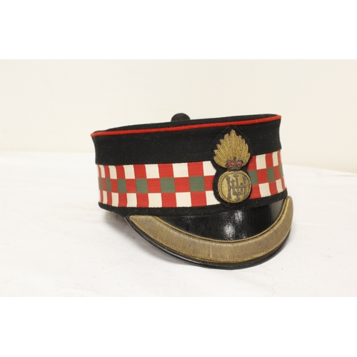 149 - Highland Light Infantry officer's dress cap, an antique French military officer's Kepi and another. ... 