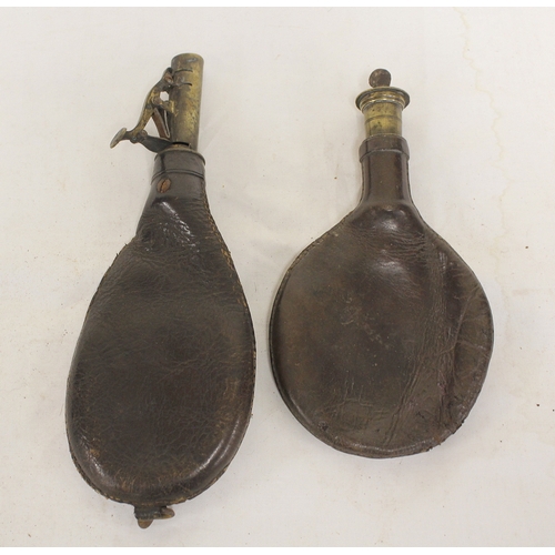 152 - Two leather powder flasks with brass spouts, riding flask holder etc. (5).