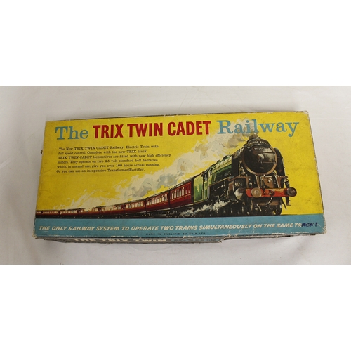 343 - Box of engines & rolling stock in a Trix Twin Cadet Railway box. Some original Trix components b... 