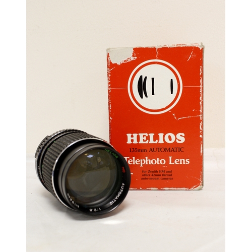 375 - Cased Zenit TTL SLR camera with Helios lens, also included is a Helios 135mm F2.8 telephoto lens in ... 