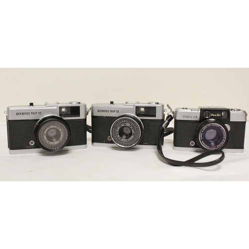 379 - Selection of vintage film and digital cameras to include two digital Olympus cameras, two Olympus Tr... 