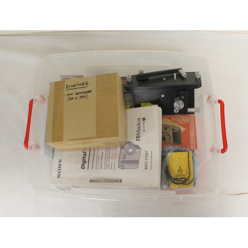 386 - Box of photography equipment to include filters, flashguns and light meters. also included is a hand... 