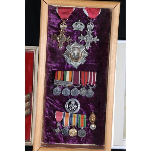 79 - Grouped collection of medals within box frame including Crown badge and Royal Scots cap badge of Col... 