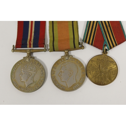 80 - Medals. (7) WW II group. 1939-45, Atlantic, Africa, Italy Stars, War & Defence Medals. Also Russ... 