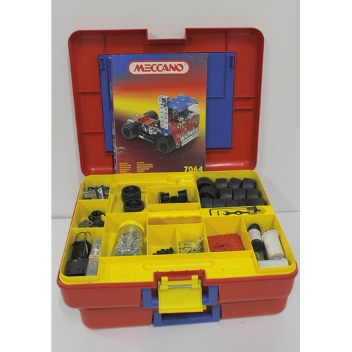 305 - An extensive collection of Meccano construction parts within four plastic carrying cases with sectio... 