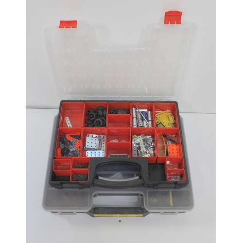 305 - An extensive collection of Meccano construction parts within four plastic carrying cases with sectio... 