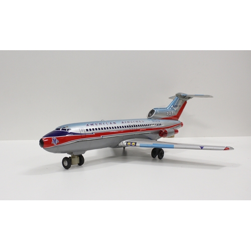 315 - Japanese tinplate battery powered model of an American Airliner Astro Jet 727 42cm long, a Marx Toys... 