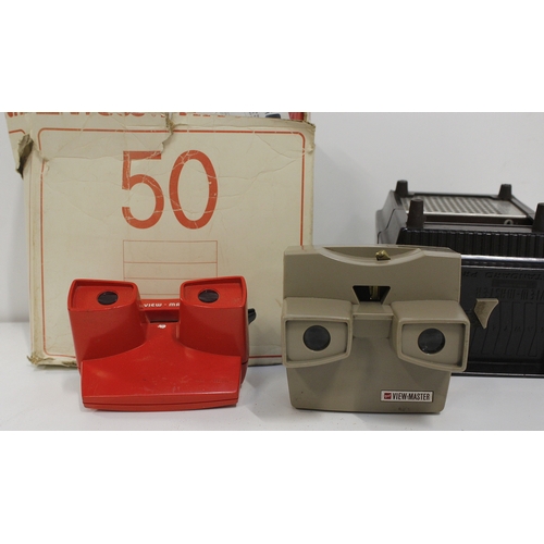 317 - 5 GAF handheld viewmaster slide viewers, also slides including Tarzan, Pinocchio, Alice and Wonderla... 